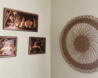 Embossed framed copper pictures & wicker wall art.