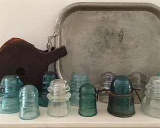 Many vintage and antique glass insulators