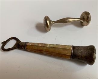 Sterling silver baby rattle and vintage or antique sterling bottle opener