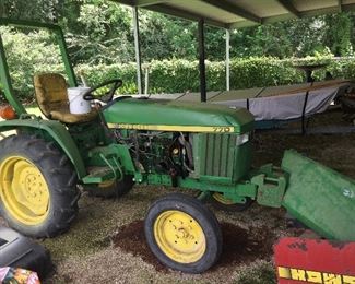 John Deere 770 Diesel tractor with 5 ft box scraper, finish mower attachment, bucket , boom and PTO  tiller—tractor has 23 hours of running time