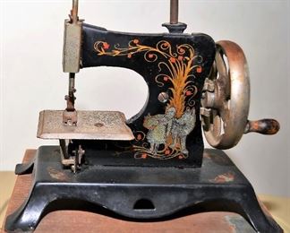 German child's little red riding hood sewing machine