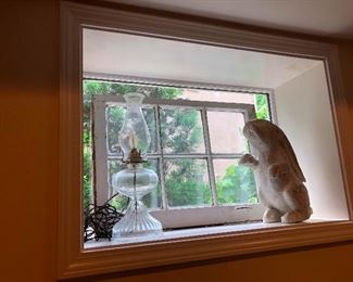 hurricane lamp, window inside a window, albino Sasquatch