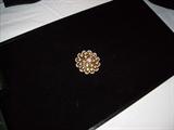 14KT yellow gold ladie brooch.
Containing 1 old European cut diamond - 2.10ct. 18 brilliant cut diamonds - 1.67ct. 36 single cut diamonds - .13 ct. Total 3.90ct.