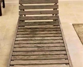 One of Three Teak Lounge Chairs