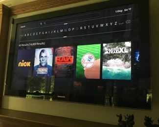 2 large flatscreen TVs
