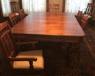 Beautiful antique table and hand carved chairs.