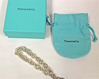  Marked “Tiffany and Company” 925 Silver Heart Bracelet

Auction Estimate $100-$200 – Located Inside 