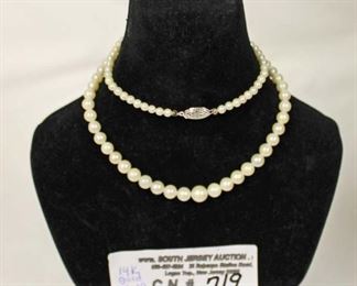 Marked 14 Karat White Gold Clasp Pearl Necklace

Auction Estimate $50-$100 – Located Inside

