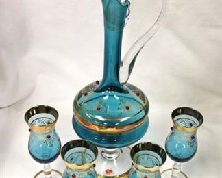 5 Piece “Made in Italy” Art Glass Decanter with 4 Stem Glasses

Auction Estimate $30-$60 – Located Inside