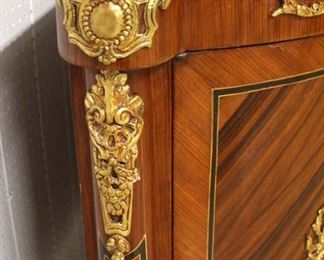 French Style Marble Top Burl Mahogany Banded and Inlaid 3 Drawer 2 Door Bronze Paw Feet and Applied Bronze Credenza

Auction Estimate $500-$1000 – Located Inside 