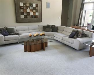 Large contemporary sectional comfortable and in perfect shape.  Rarely sat on