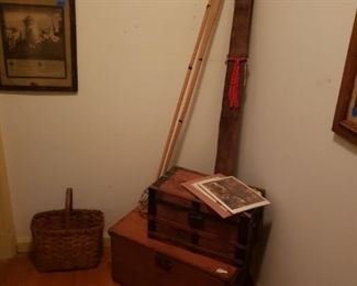 Wood ski poles, old trunks, basket