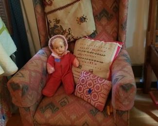 Doll, hat, pillows, and hand worked textiles