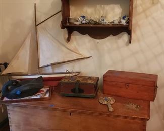 Antique blanket chest, old boxes, display shelf with doll teasets and other collectibles