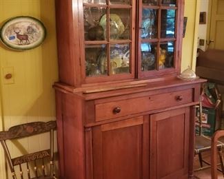 Beautiful cherry cupboard with door below, and glass above, 19th cent.; pair of Hitchcock chairs