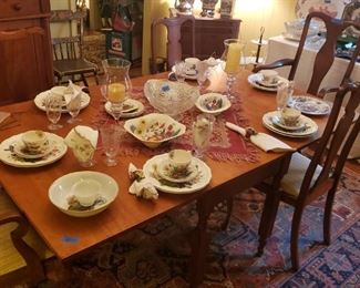 Cherry dining table, Queen Anne chairs; copeland Spode dinnerware in Reynolds pattern