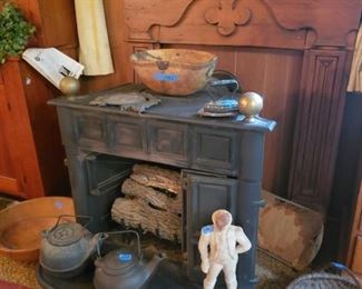 Mantle, gas stove, cast iron kettles. Door stop, baskets