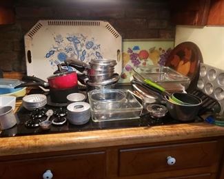 Lots of cookware, pyrex. Salad molds. Tole trays
