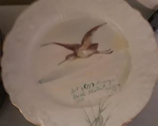 Set of 11 Limoges bird plates