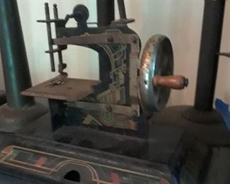 Antique sewing machine, child's 