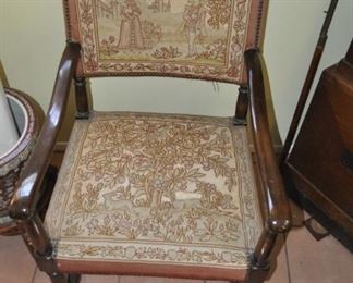 one of a pair of Antique embroidered arm chairs