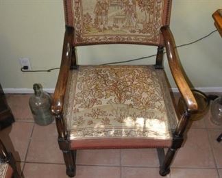 one of a pair of Antique embroidered arm chairs