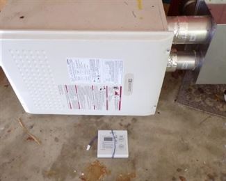 Gas Tankless Water Heater, used and works -