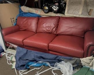 Custom made 8 ft pebble grain leather couch from Leather Creations in rustic barn red with brad detailing. Taking offers.