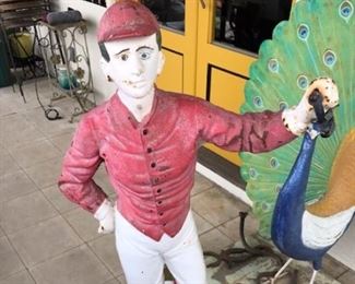 CAST IRON JOCKEY ON IRON BASE.  FOUNDRY SIGNED but I can read it.   STANDS 50" TALL WEIGHT approx. 150lbs.    $900.00 