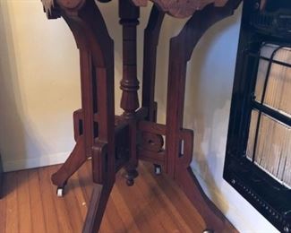 Victoria Eastlake end table original caster and finish, wood top.  $75.00