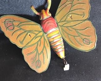 The Ferdinand Strauss Corp. $300.  Tin Litho wind-toy totally functional and in excellent condition.   