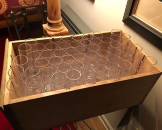 dozens of glass bud vases. Perfect for wedding or party