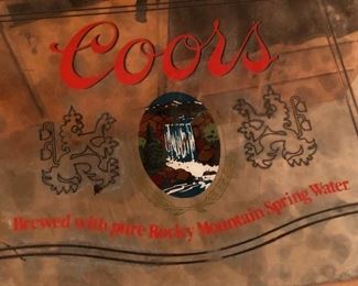 mirrored coors sign