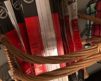 basket full of vintage slide rules