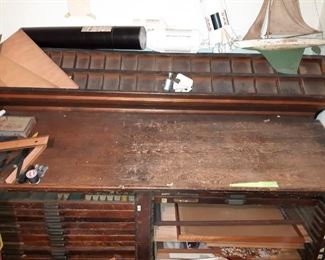 As soon as we get this unearthed you will have a better view of this old printers type set desk.