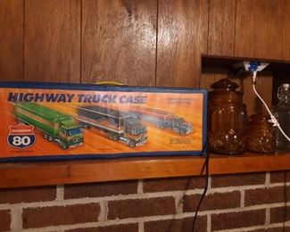 Highway truck case and many other Matchbox Hot Wheels car cases, as well as many bags of tires