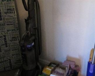 Dyson vacuum cleaner and Shark steam mop