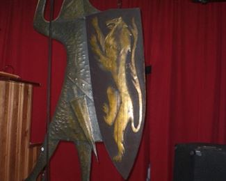 5' Brutalist wall sculpture of a knight in armor with shield in hammered steel and brass