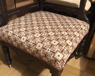 Corner mahogany chair with casters