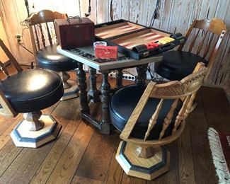Game table chairs and octagonal metal-topped table