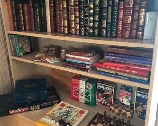 leather bound books, chess set and games