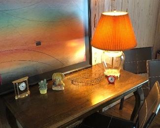 Walnut desk, framed print, clear glass table lamp and brass desk clock
