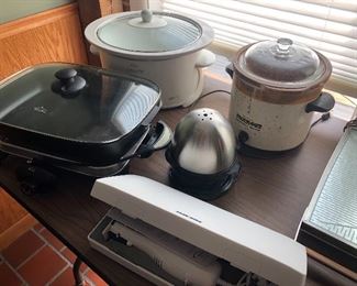 small appliances:  crock pots, electric skillet, carving knife, egg cooker, and hot plate