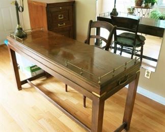 Desk, wooden file cabinet, desk lamp