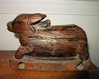 Antique wooden carved animal