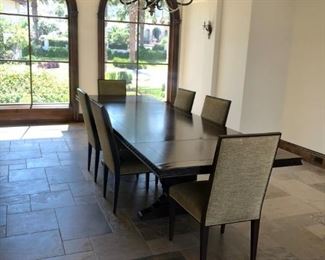 Dark wood dining table. Pre-sale available at highlinefurniture.com please visit website for pricing information.