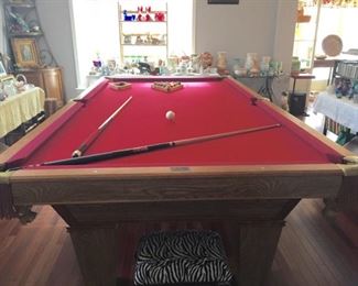 Brunswick Billiard pool table with cues