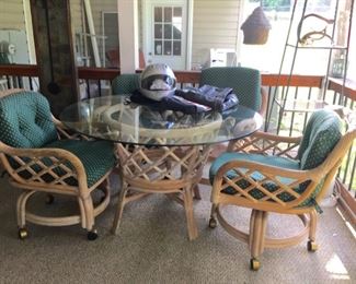 Patio set details with motorcycle helmet and leathers