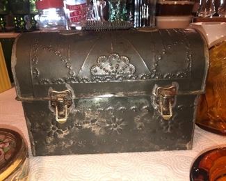 Decorative punched tin lunch box