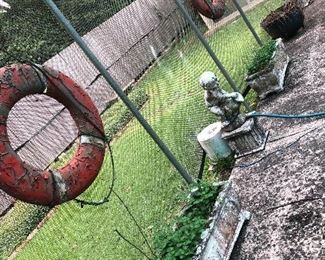 Life preservers and concrete yard items
